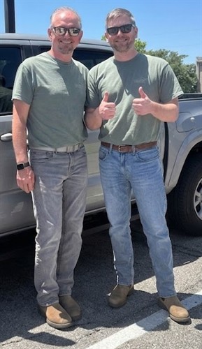 Gallery Image Will_and_Austin_by_truck_2.jpg