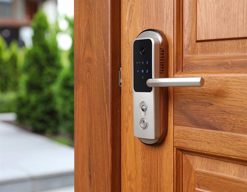 Smart Security Locks with Fingerprint Detraction and Integrated Cameras