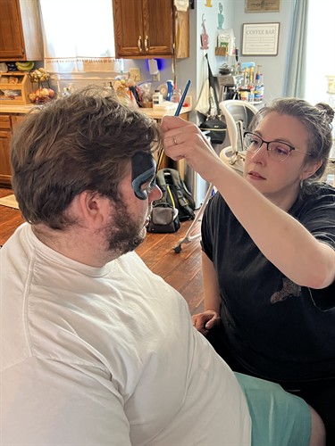 me painting a client in their home