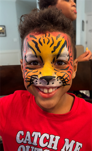 boy with tiger face paint