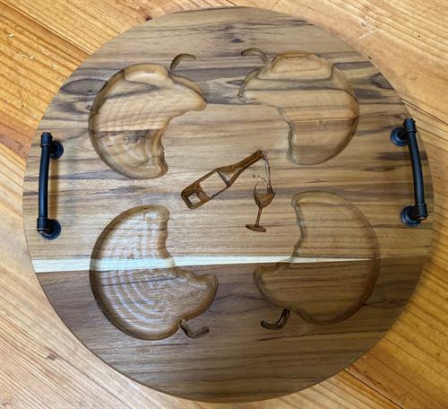 carved wooden tray with apple design