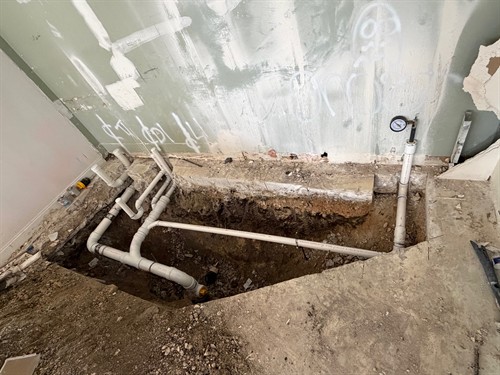 Ever wonder what was UNDER your bathroom? All pipes are pressure tested before concrete covers your pipes.