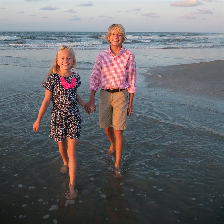  Photograph of Siblings Walking on the Beach at Folly Beach