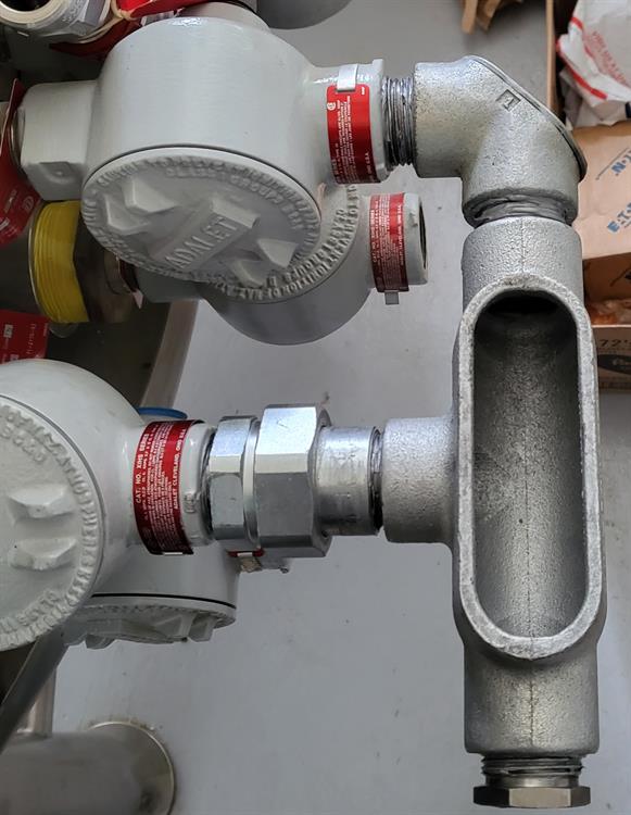 Rigid conduit for explosion proof heater boxes in a hazardous environment