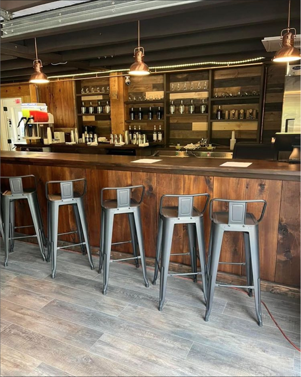 Interior of distillery with led lighting in a repurposed barn microbrewery