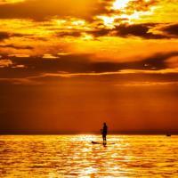 Sunset Stand Up Paddleboarding