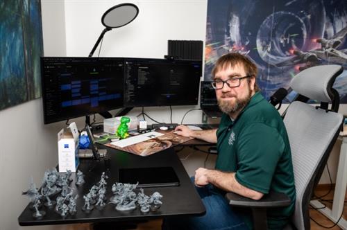Brian at his very nerdy desk