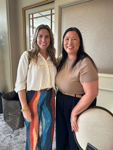 Agency Owner and Ritz-Carlton Yacht Collection manager, Kathy, at a partnership meeting. 