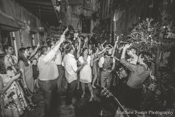 Gallery Image 23000162_1855772651119346_7336316262622668219_o_-_Kern_Wedding_-_Black_and_White_Hands_in_the_Air_(350px).jpg