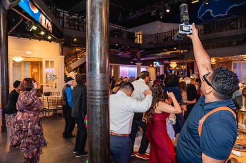 Chad Populis photographing a wedding at Generations Hall.
