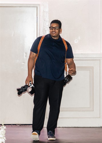 Chad Populis photographing Karin and Walter’s wedding at Generations Hall in New Orleans.