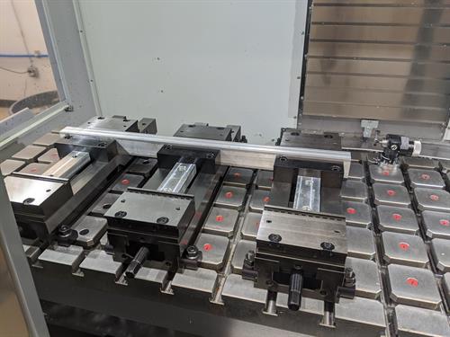 3 Vises lined up to hold extra long parts 3 Vises lined up to hold extra long parts