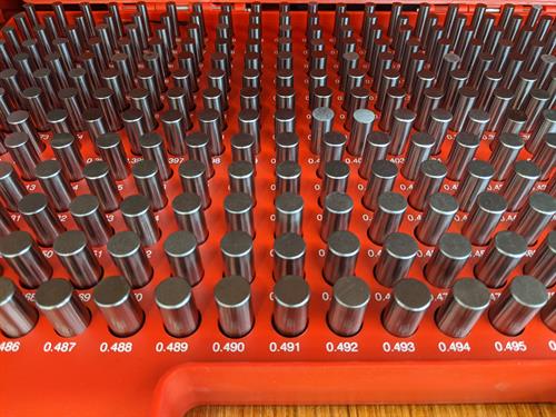 Precision ground gauge pins used to ensure accuracy of holes Precision ground gauge pins used to ensure accuracy of holes