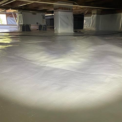 Encapsulate crawl space with vapor liner and dehumidifier. 