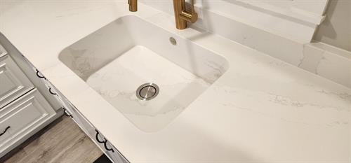 Eternal Calacatta Gold Integrated Quartz Sink by Cosentino