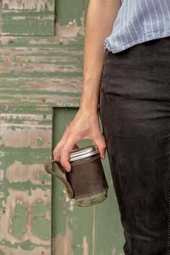 We make leather coffee mugs that you can put your logo on!