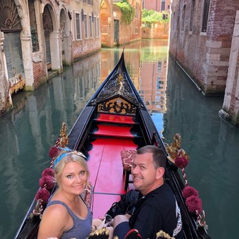 Customers on Gondola ride in Venice
