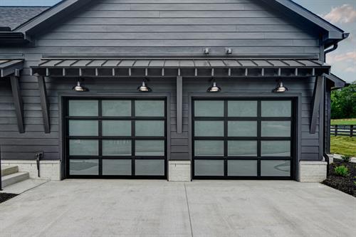 Beautiful Avante-style glass garage doors transforming this Franklin home. Sleek, modern, and built to make a statement.