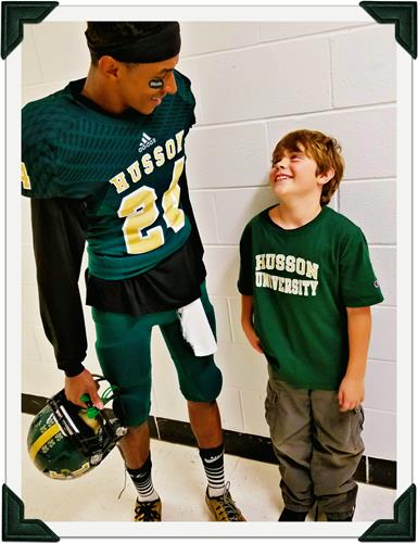 Gallery Image 2_Husson_football_Big_and_LIttle_(Alphonso_and_Zane).jpg