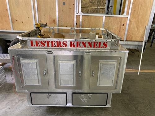 Custom built double wall insulated dog box with lights and water tank for Lester Kennels