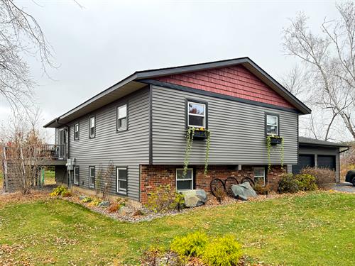 Breathtaking modern transformation - siding, soffit, fascia, gutters, wraps, doors, we do it all!