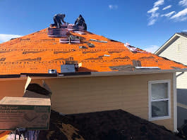 Roofing project in progress.