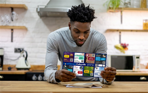Gallery Image Man_reading_local_Savers.png