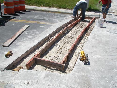 (DURING)....Reform for stamped concrete (Brick) pattern Municipal city walk-way