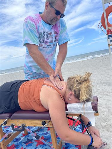 Walk-In Chiropractic adjustment on the beach