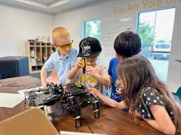 Kids learning coding in a school enrichment workshop