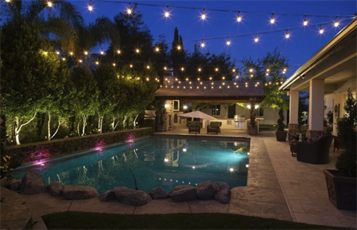 Transform your backyard into a resort-style oasis. Our custom bistro lighting installations over pools feature heavy-duty commercial cabling and precision tension wiring for sleek, hazard-free, and weather-proof warmth. Perfect for year-round evening swims, outdoor entertaining, and Westside estate living. Schedule your custom design consultation at lightsuptoday.com or call (310) 356-9577! ???