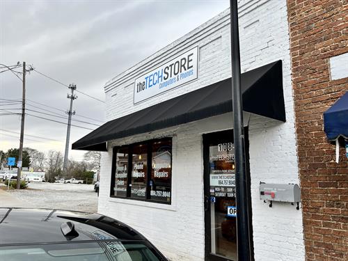 Our Simpsonville store is across from the Chamber, next to the gravel parking lot on W. Curtis.