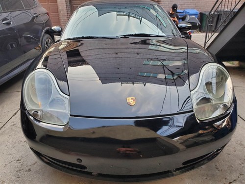 Porsche 911 Carrera after headlight restoration — downtown Chicago