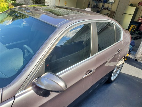Faded gray trim restored to deep black with ceramic coating — Wheaton, IL