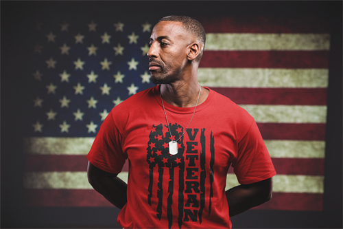 Gallery Image man-wearing-a-tshirt-mockup-standing-against-an-american-flag-a20924.png