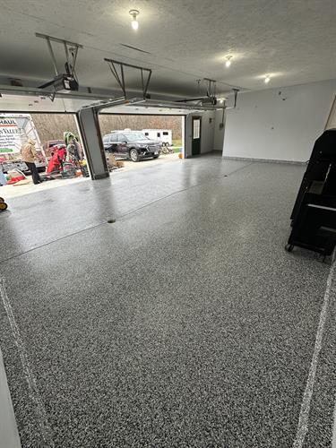 After Garage Floor Coating using our Silverton Color with Polyaspartic Top Coat