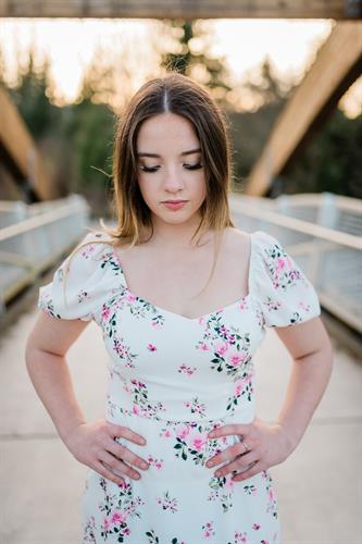 High school junior portrait on the bridge at Confluence Park Issaquah by Katie Niemer Photography.