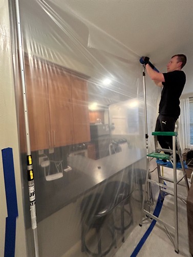 Building containment for water damaged kitchen
