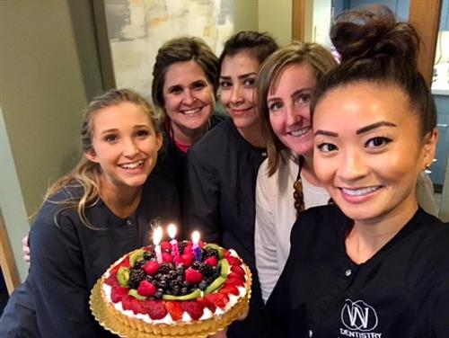 Dr. Woo and team celebrating a birthday. Dr. Woo and team celebrating a birthday.