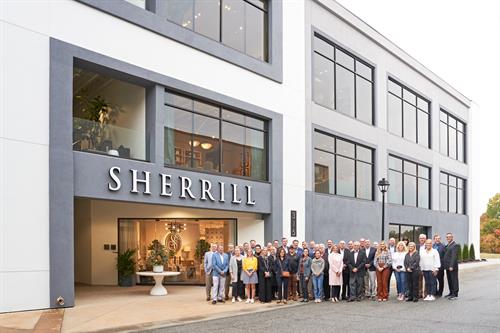 Team Sherrill outside of the Sherrill Showroom during the High Point Furniture Market.