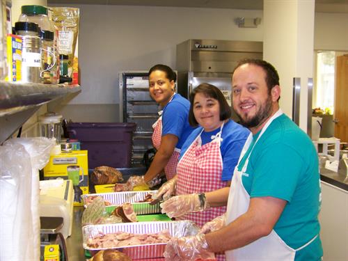 DHW employees serving at the Hickory Soup Kitchen