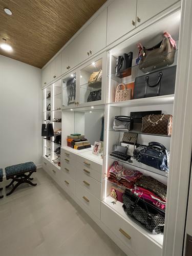 Beautiful Boutique closet design by Megan for M Viamontes Architects