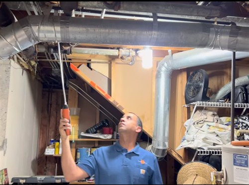 Using a gas detector to find leaks in an HVAC system