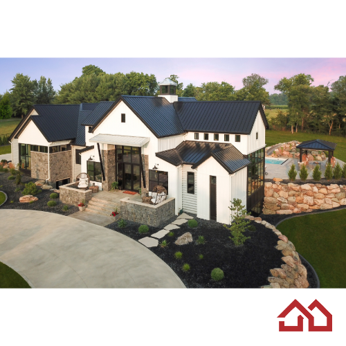 This modern farmhouse exudes elegance with its steel-clad exterior, Rocky Mountain Castlestone accents, and a charming cupola. Floor-to-ceiling Marvin windows flood the living spaces with natural light and offer stunning vistas of the surrounding countryside.