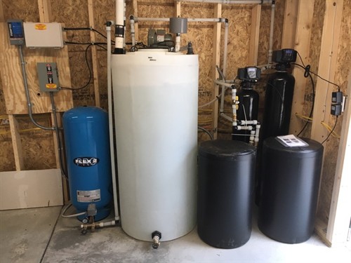 Water Treatment System including Radon Mitigation