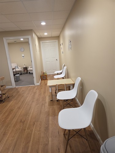 Kid friendly waiting area with sensory toys.