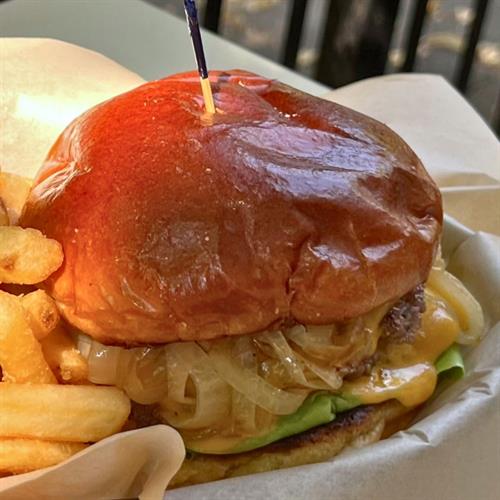 Super Smash Burger Basket with side of fries.