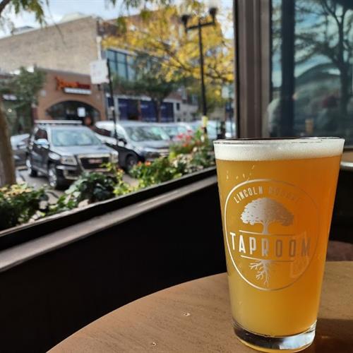 Locally brewed beer in open window table.