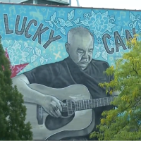 New mural pays tribute to John Prine on Old Town School of Folk Music building