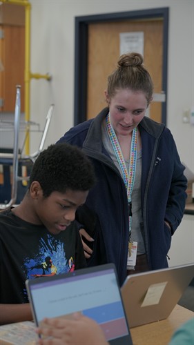 Nichelle Curtis working with our students focused on Science